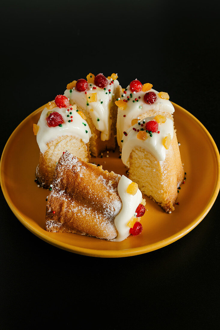 Bundt cake with cranberry and Christmas sugar sprinkles