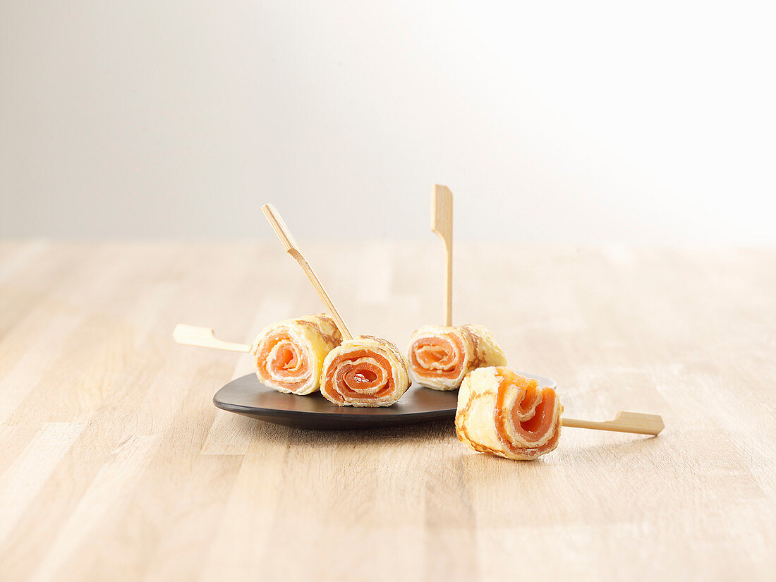 Crêpe rolls filled with smoked salmon