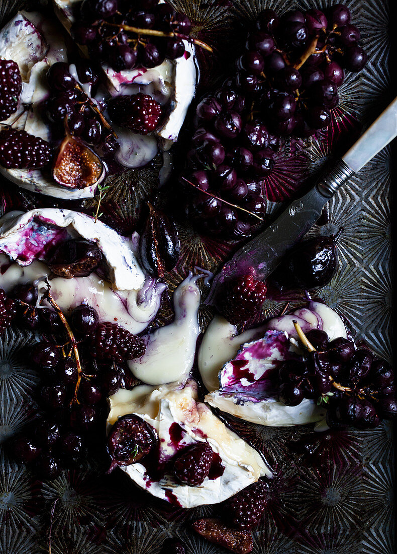 Brie with roasted concord grapes, figs, blackberries and thyme with balsamic vinegar and honey