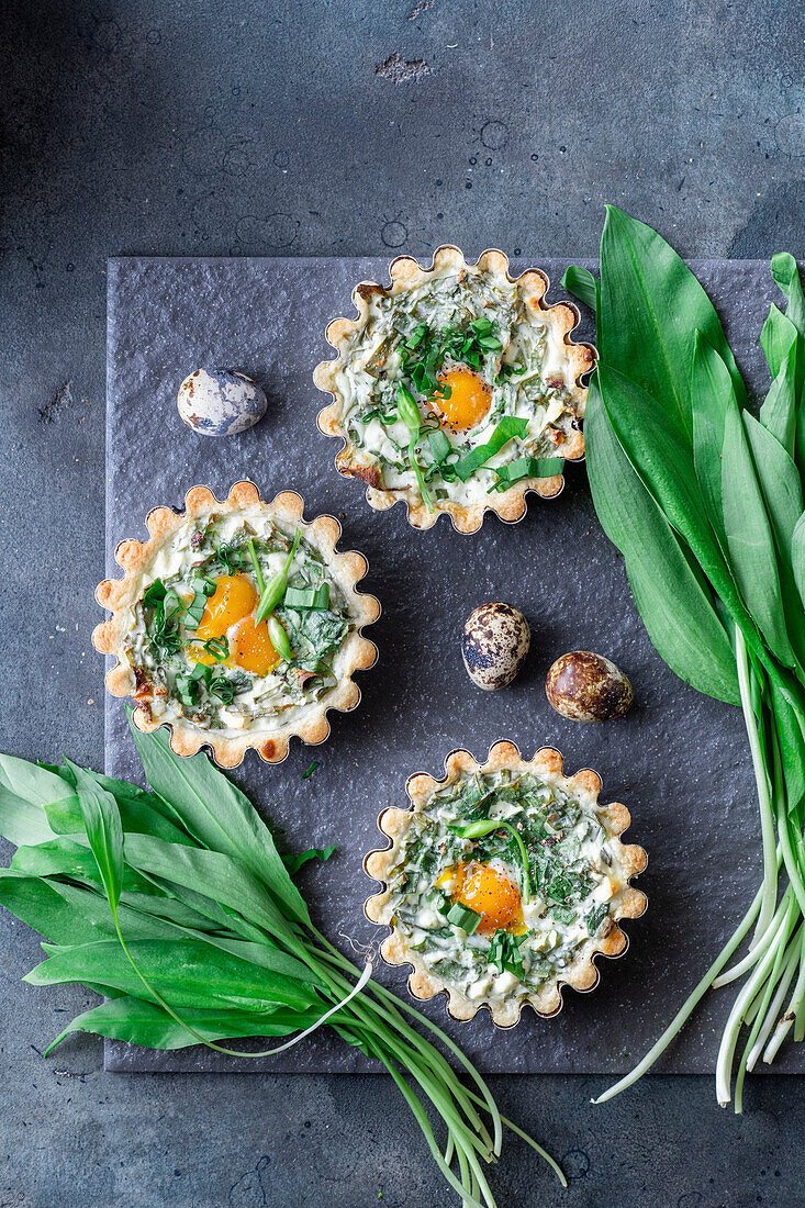 Wild garlic tartlets with quail eggs