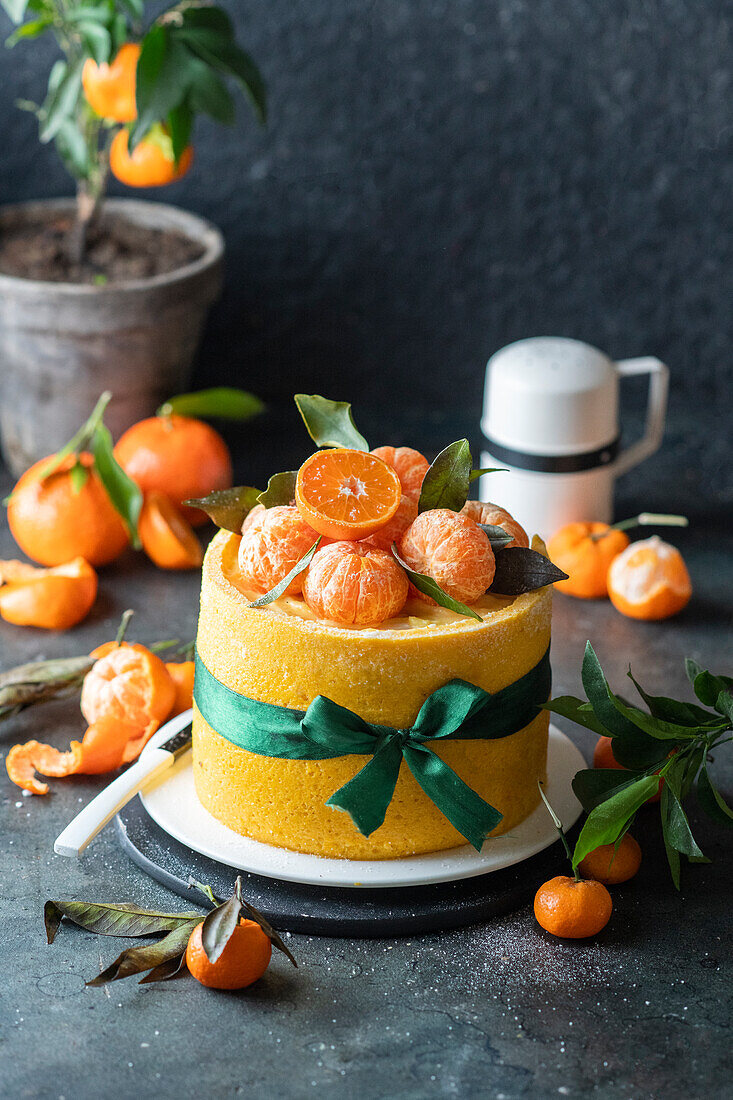 Tangerine profiterole tart with Japanese sponge cake and tangerine curd