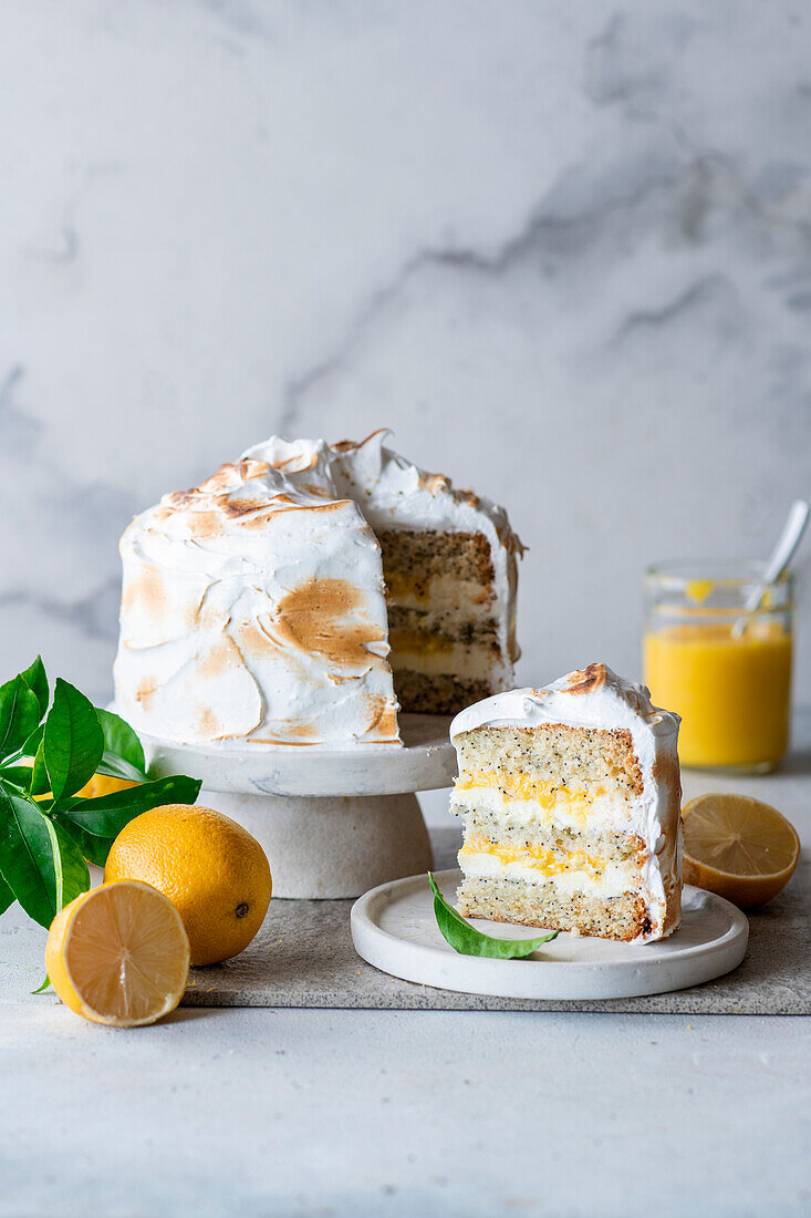 Lemon meringue cake with poppy seeds and lemon curd