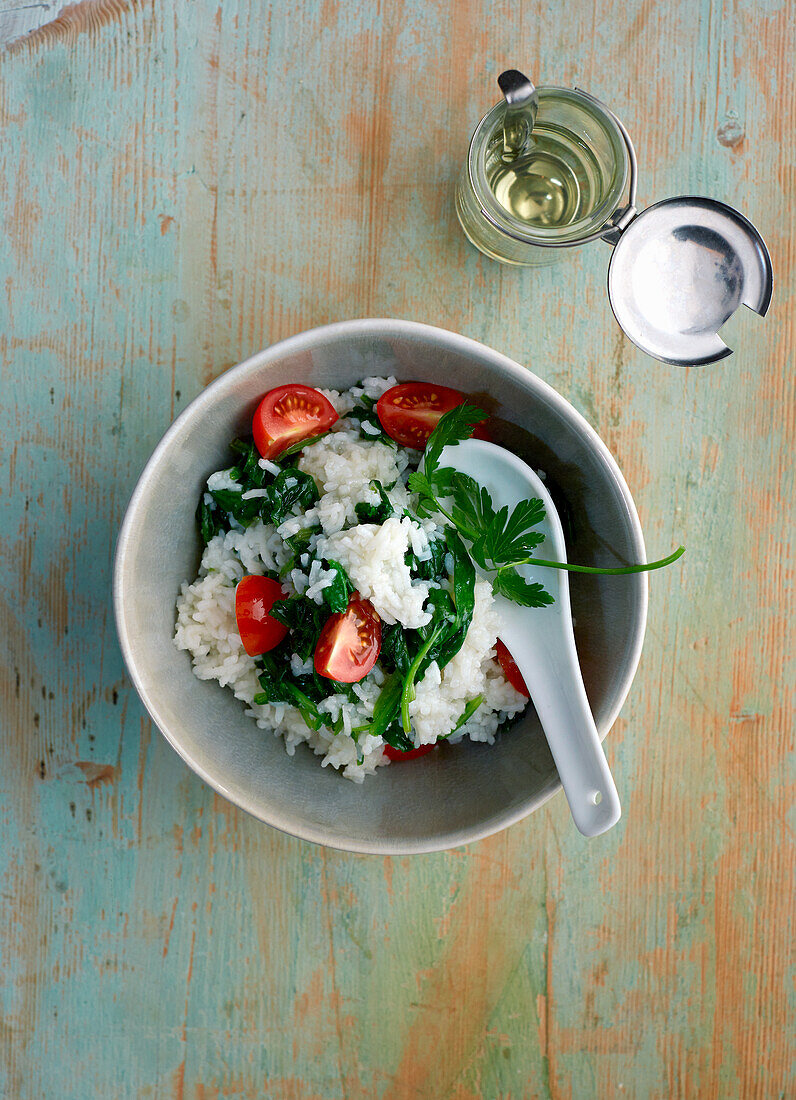 Rice with spinach and diced tomatoes