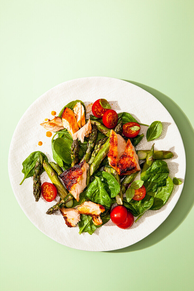 Asparagus salad with harissa salmon