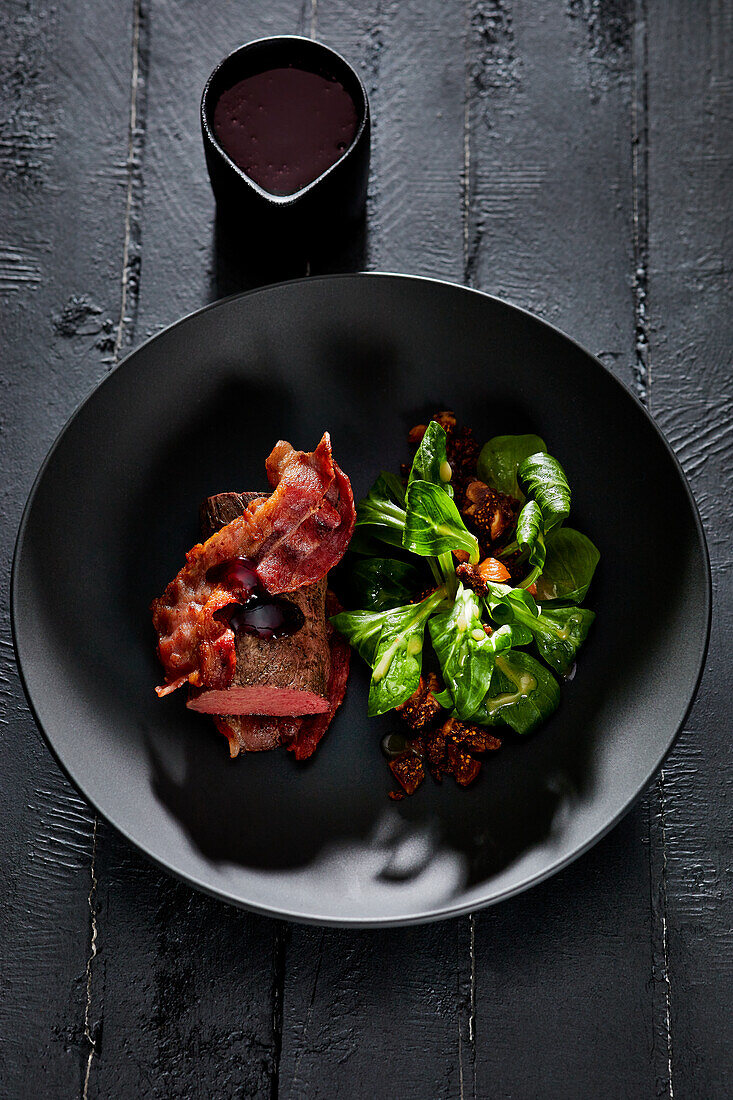 Roast venison with bacon and lamb's lettuce