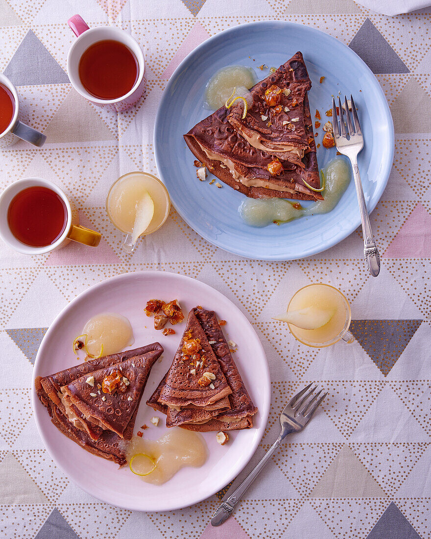 Chocolate crepes with hazelnuts and pear puree