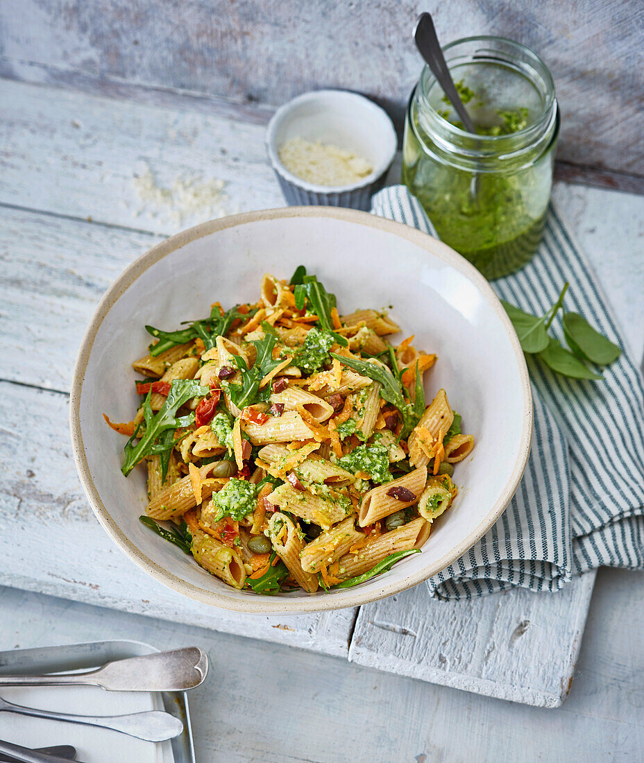 Wholemeal pasta salad with rocket, capers and carrot pesto