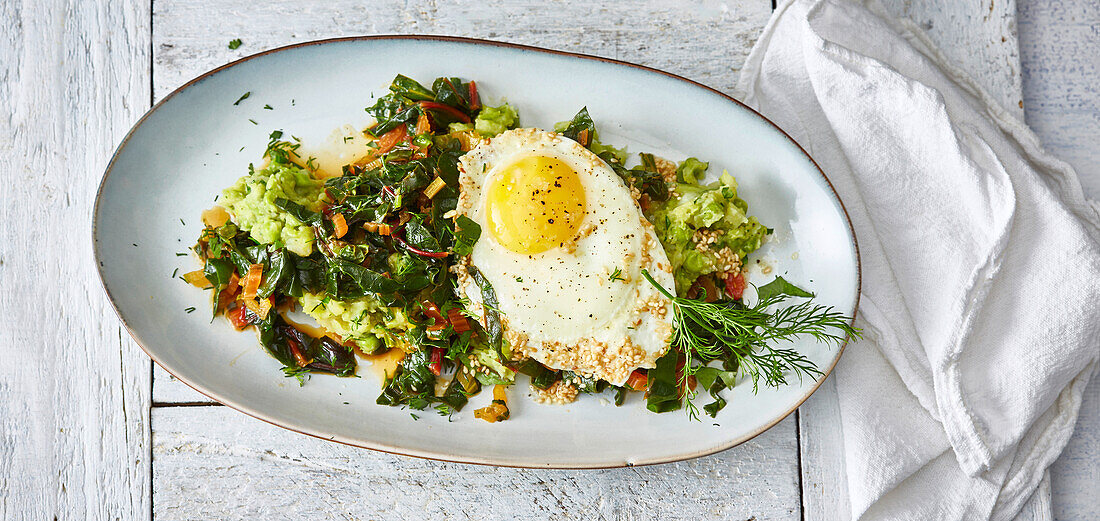 Pea and celery puree with a fried egg