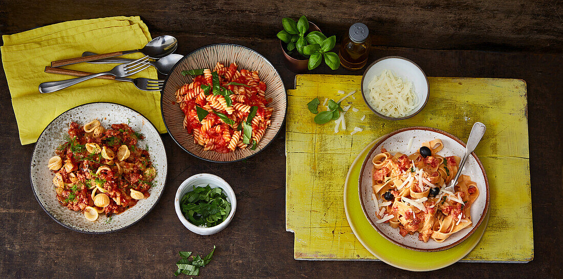 Pasta with tomato and goat's cheese sugo, with salsiccia sugo and with tomato and pepper sugo