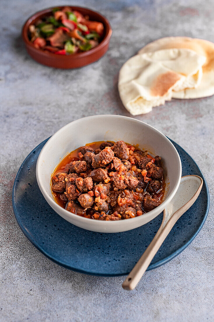 Sojouk or Sujuk or sucuk is a spicy and fermented ground meat sausage which is consumed in several Balkan, Middle Eastern and Central Asian cuisines.