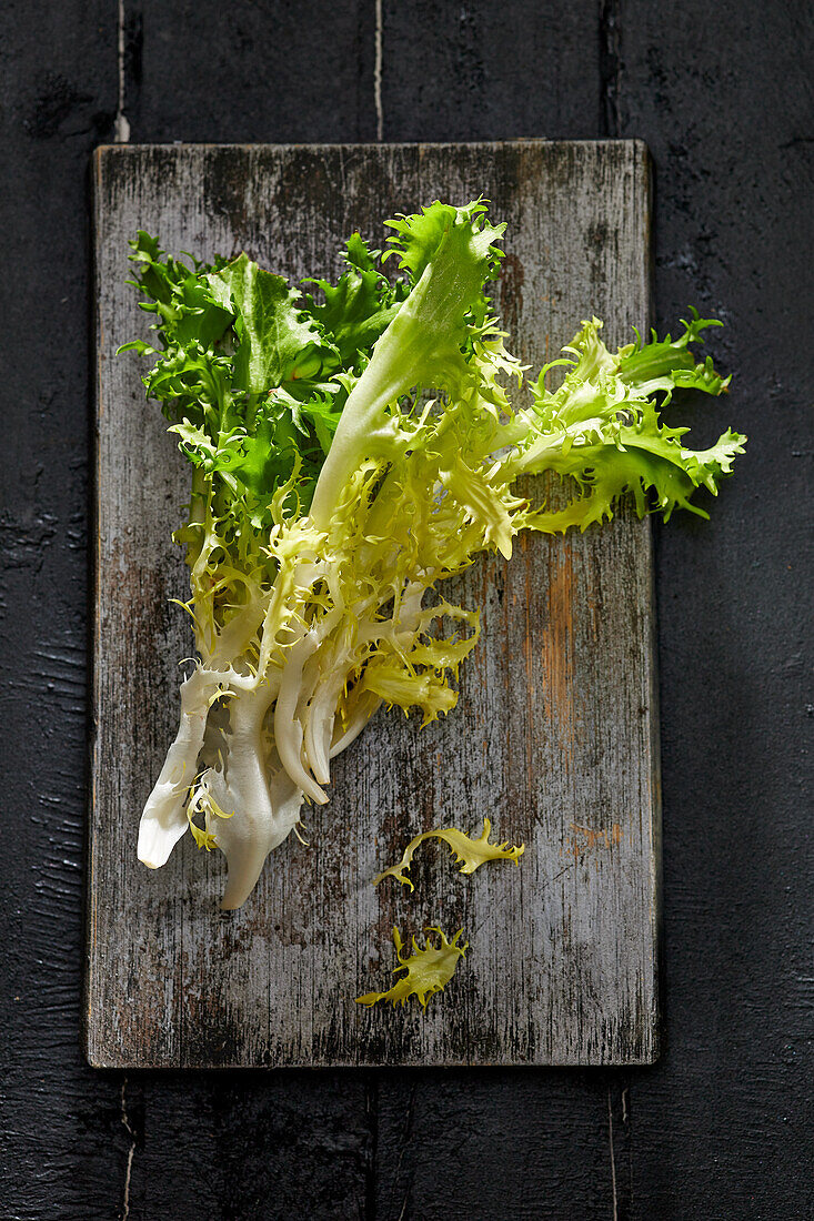 Fresh lettuce on a wooden board