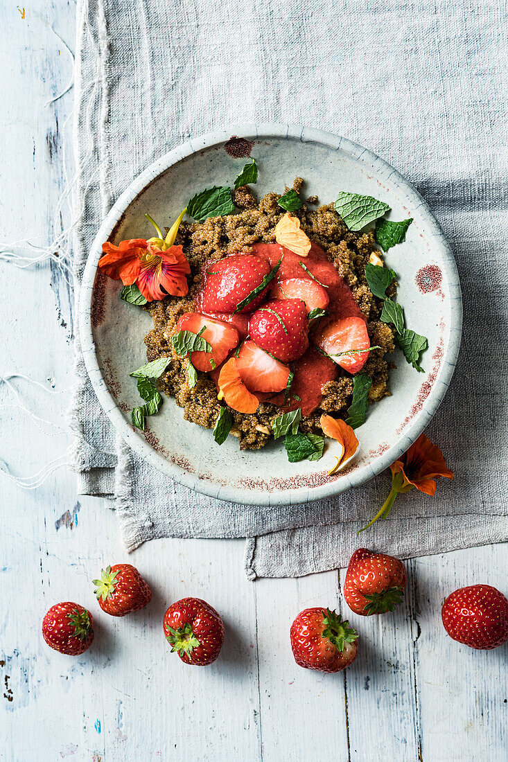 Amaranth and coconut porridge with strawberries