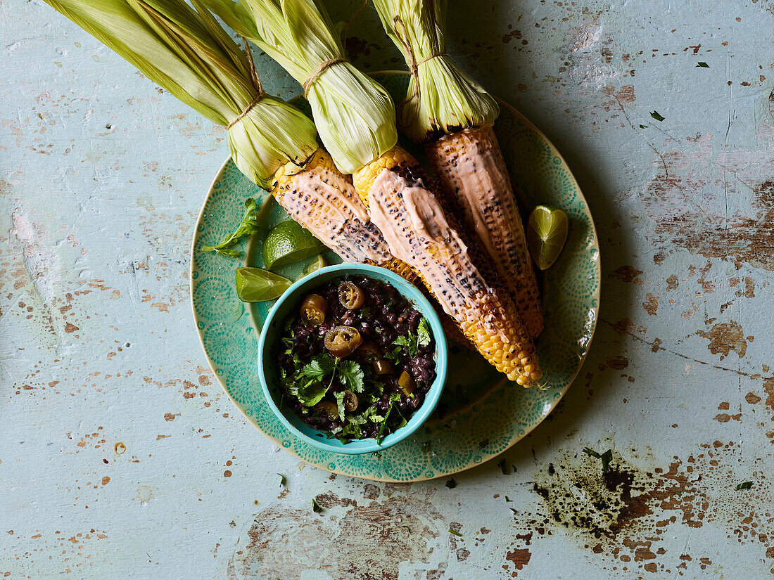 Smoky grilled corn on the cob with bean puree