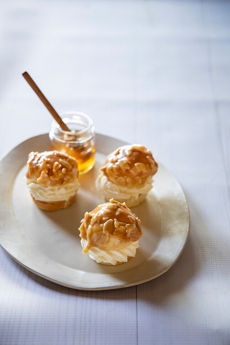 Profiteroles with caramelised almonds