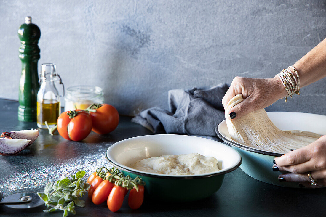 Pizza dough being made