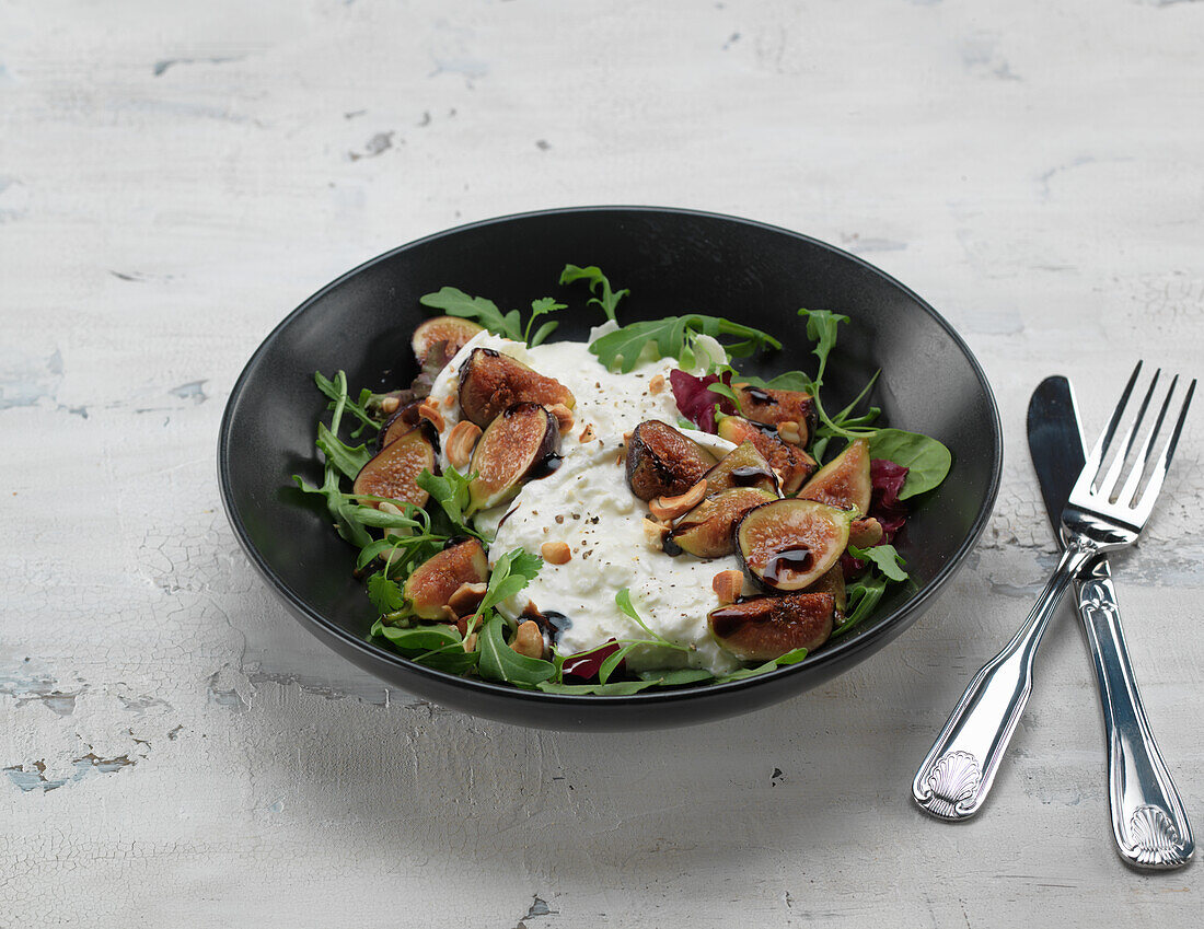 Roasted figs with burrata and rocket