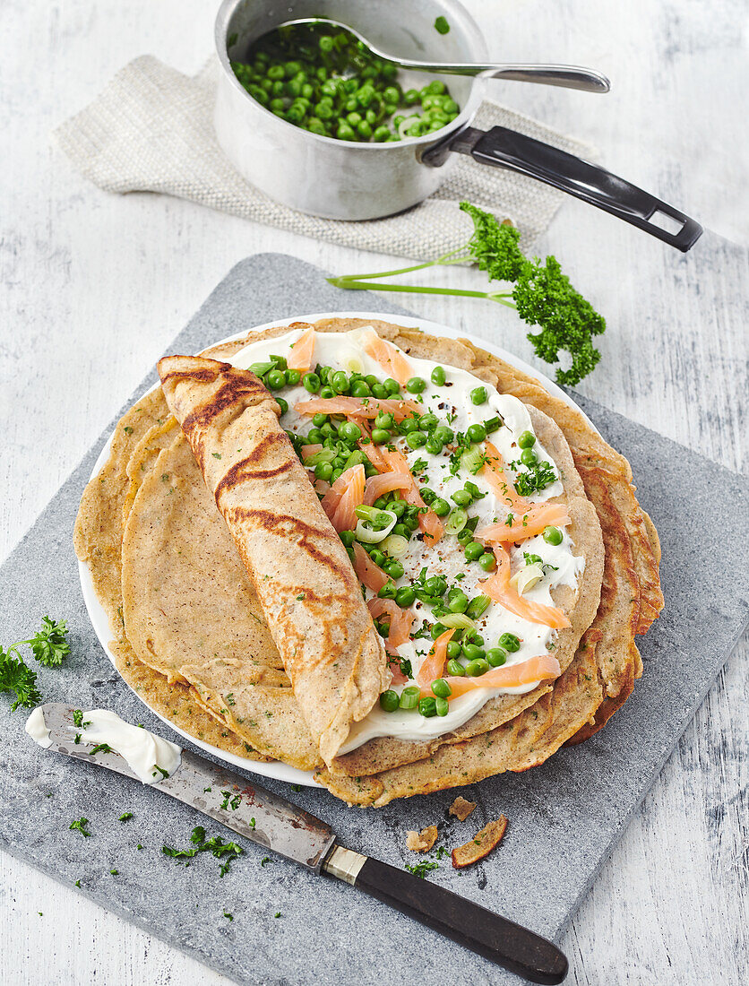 Buckwheat pancake rolls with pea-salmon filling