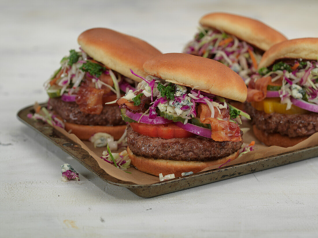 Burgers with bacon, gorgonzola and coleslaw