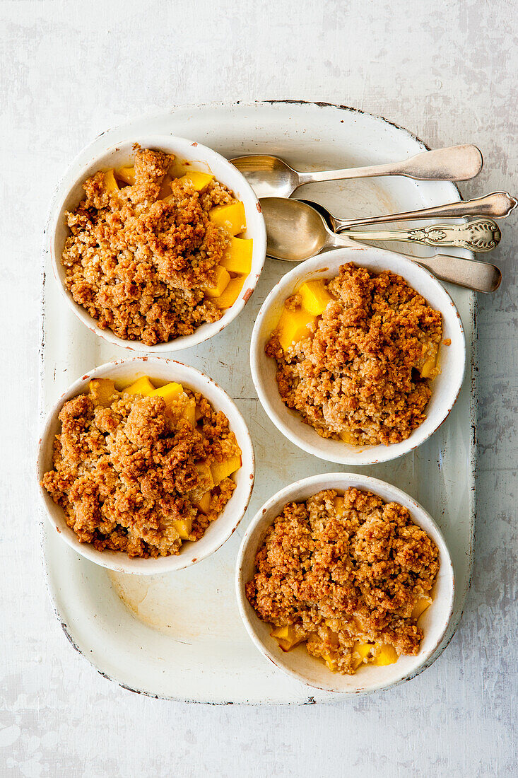 Mango and coconut mini crumbles