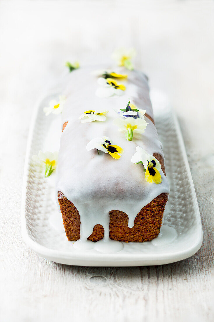 Lemon polenta loaf with edible flowers