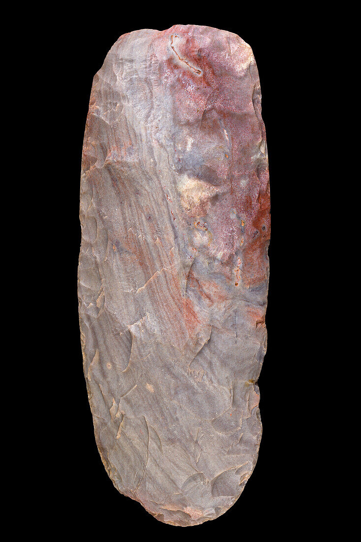 Neolithic ax cut in pink jasper