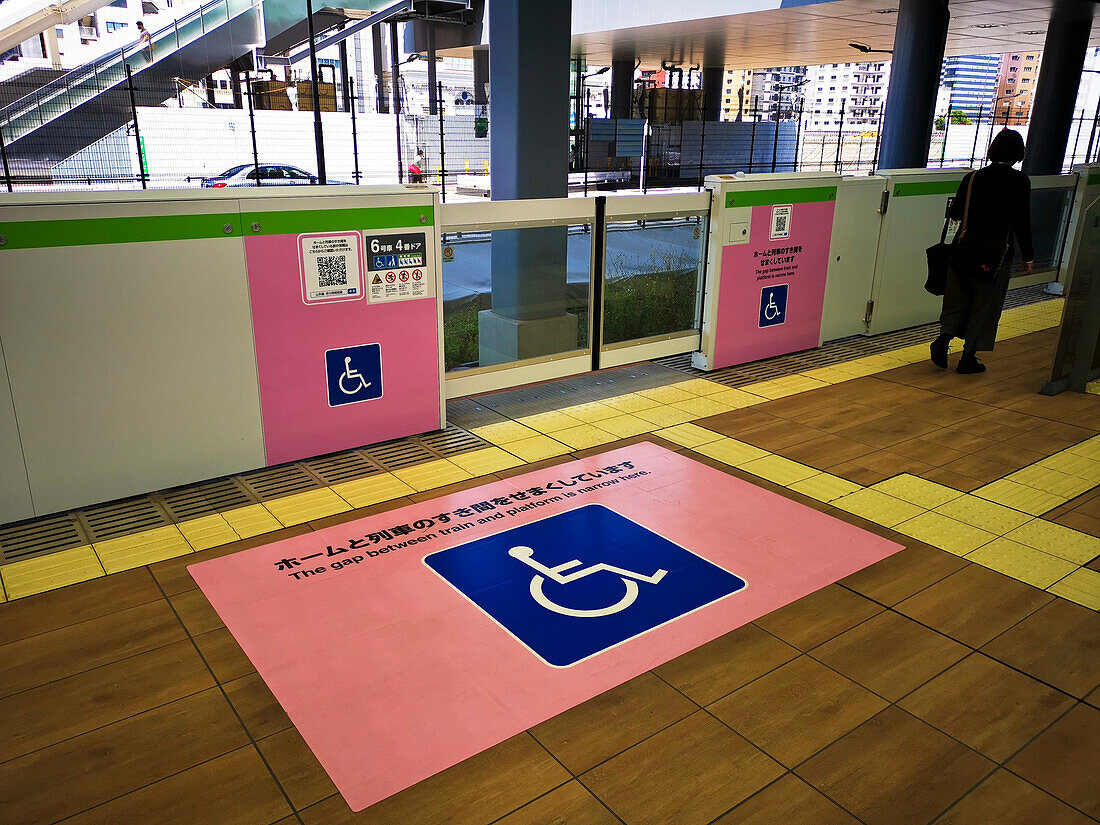 Wheelchair access at a train station, Tokyo, Japan