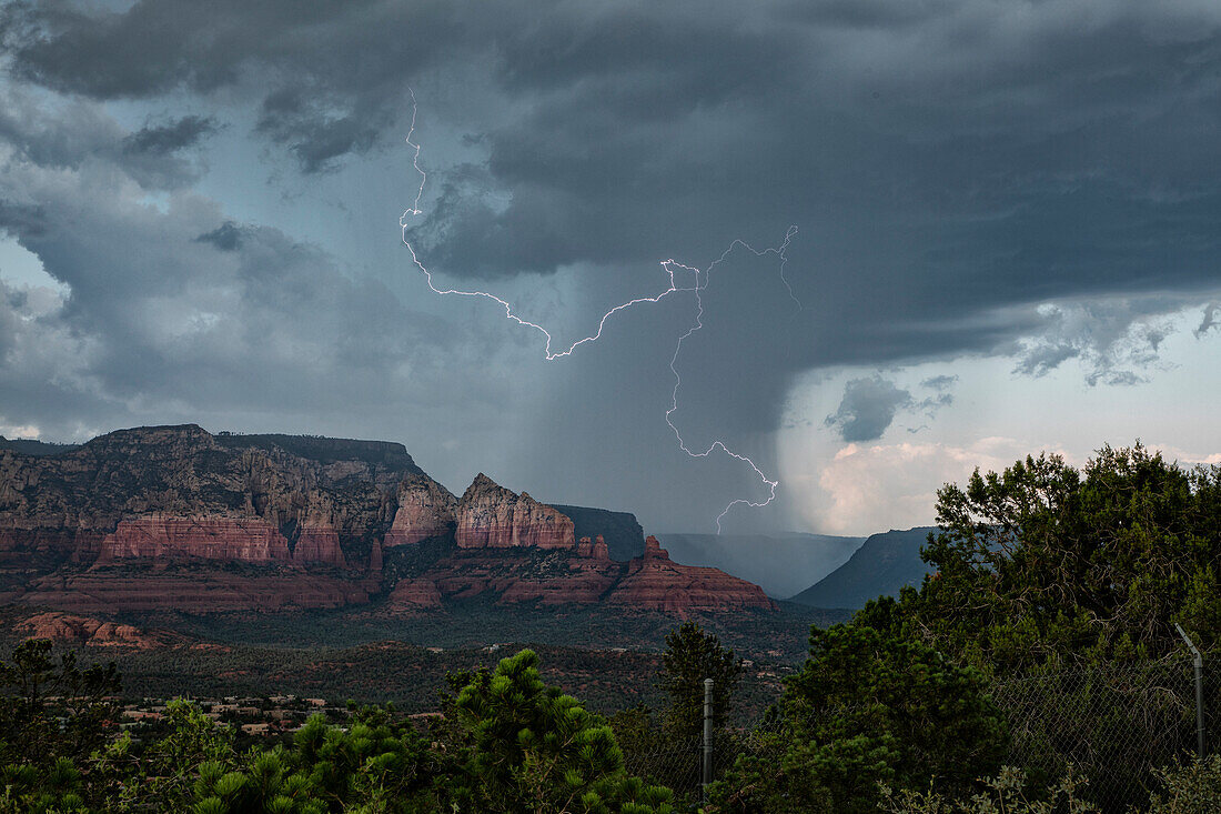 Lightning over red rock, Arizona, USA