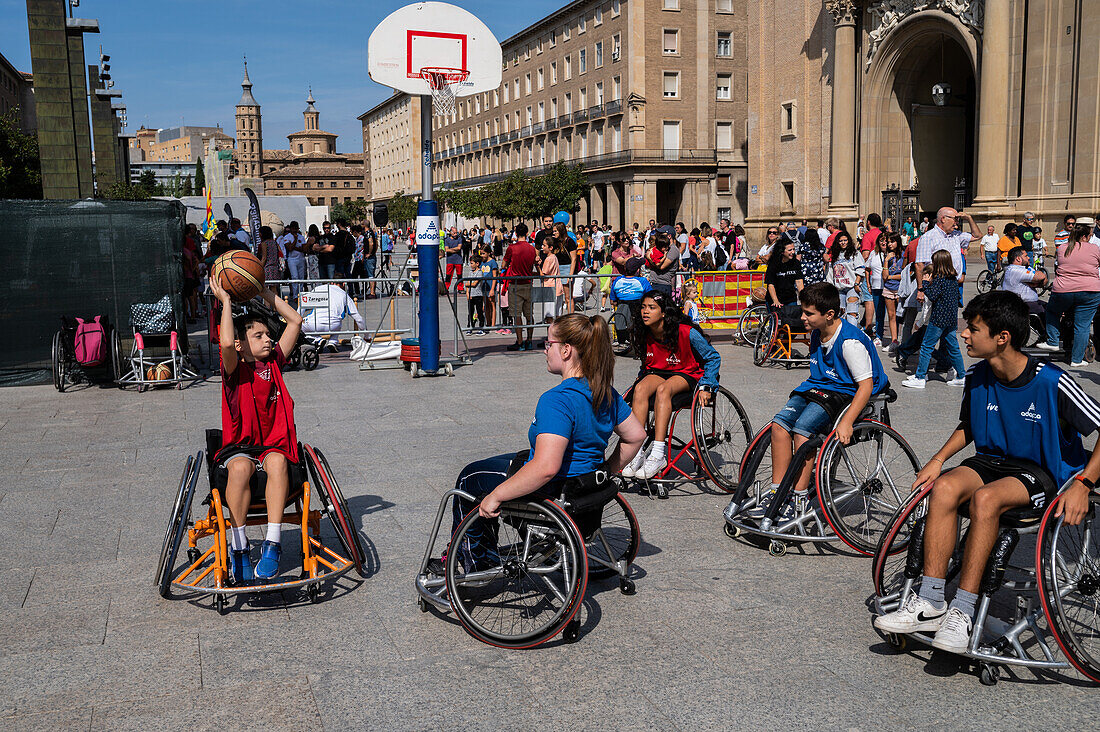 Children playing wheelchair basketball