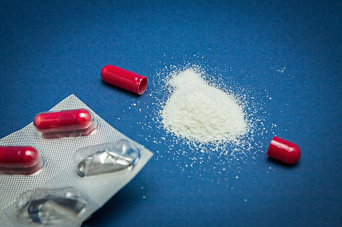 Opened capsule containing granular drug
