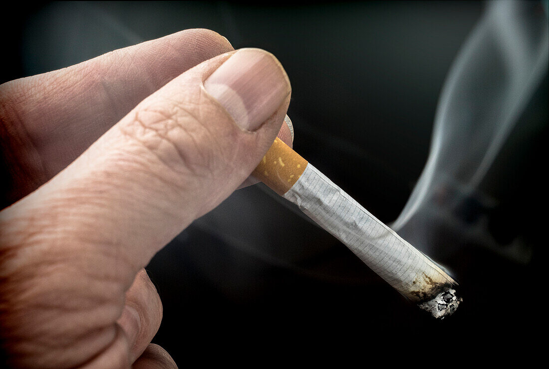 Smoker holding a cigarette