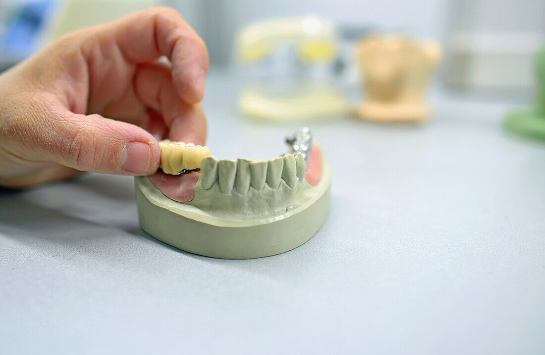 Dental technician working in laboratory