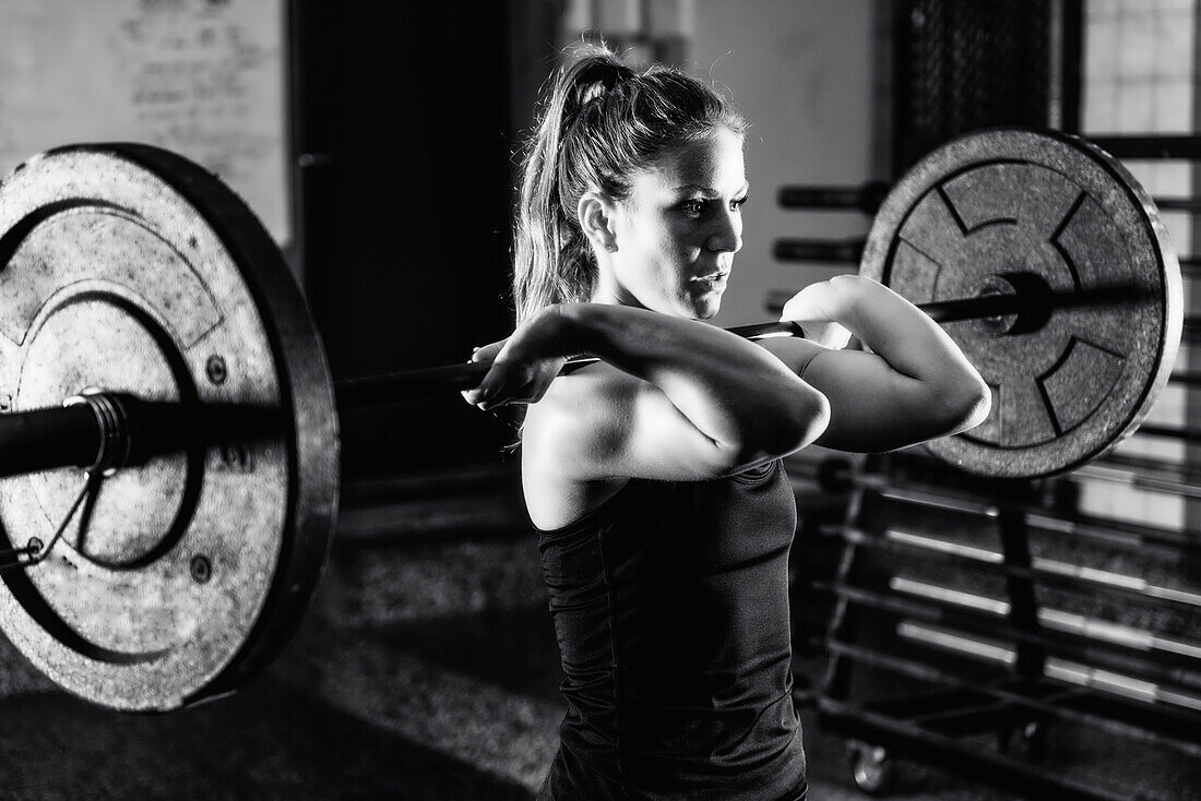 Female athlete lifting weights