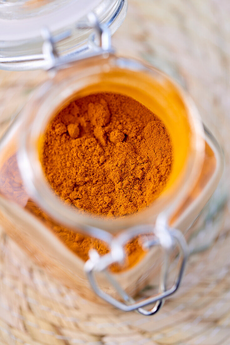 Turmeric powder in a jar