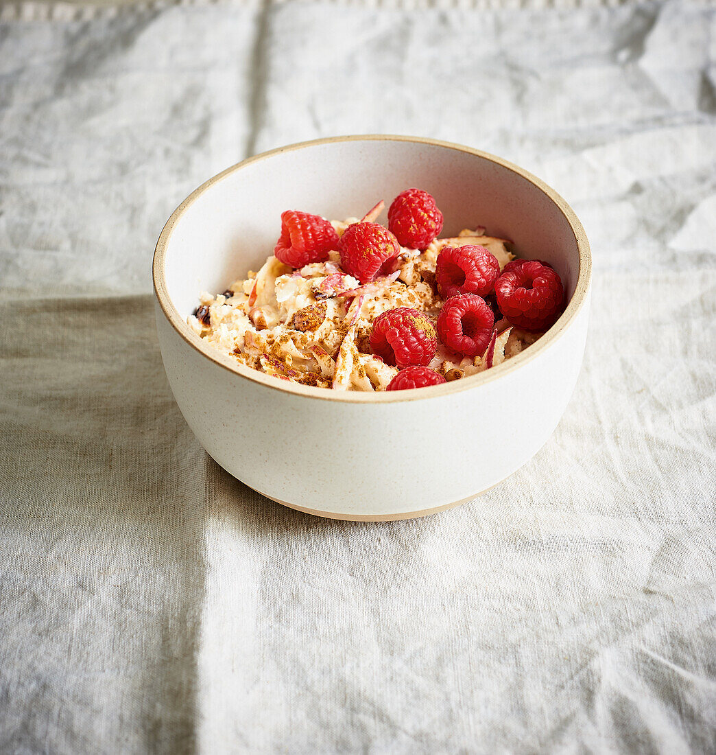 Filling Bircher Muesli with Raspberries