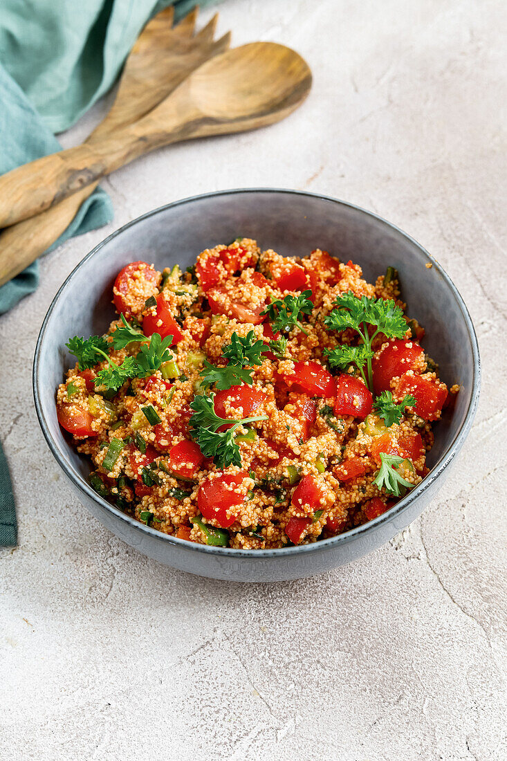 Spicy couscous salad with tomatoes and mint