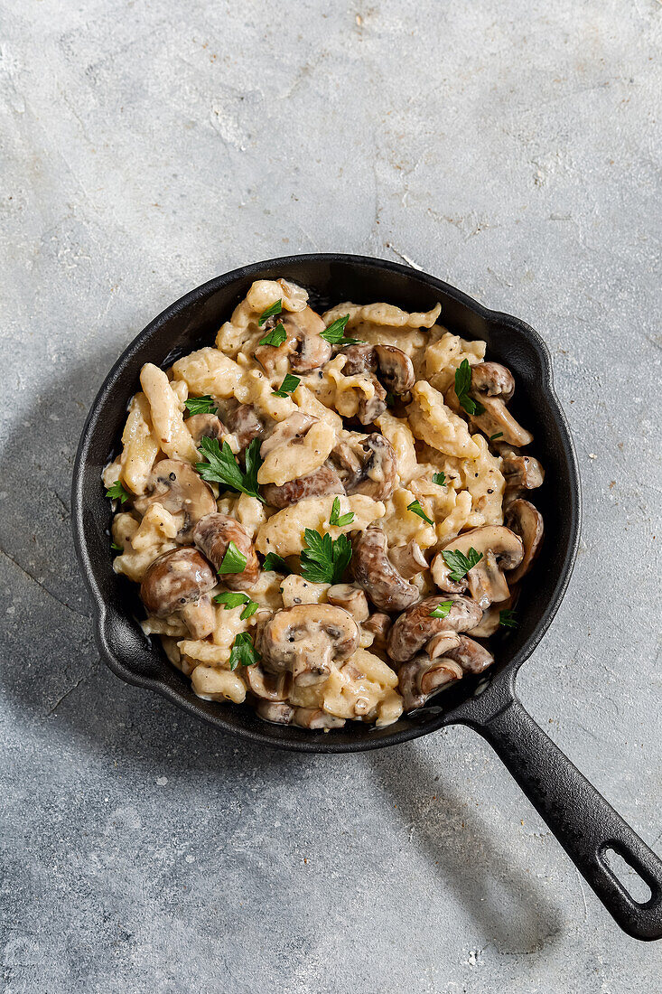 Vegan spaetzle with mushroom cream sauce