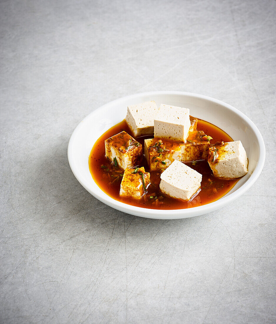 Tofu cubes in marinade