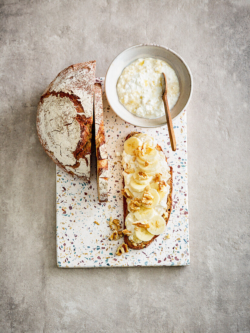Wholemeal bread with banana cream cheese and nuts