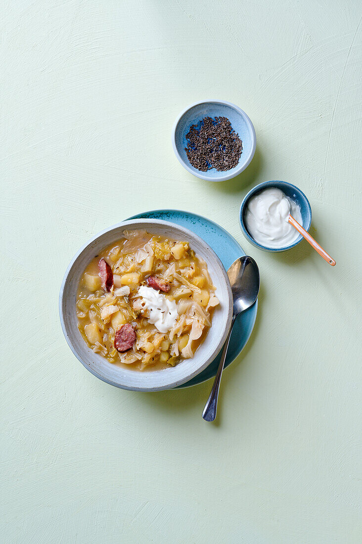 Savoy cabbage and potato stew with sausage