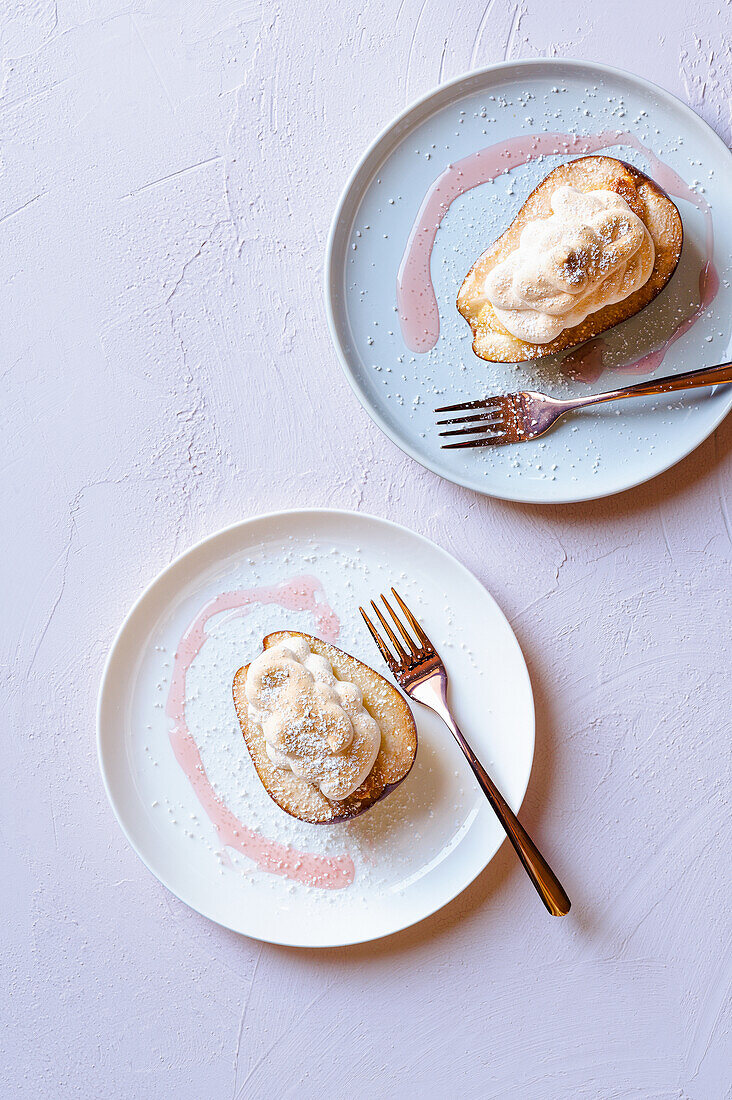 Baked spiced pears with meringue topping