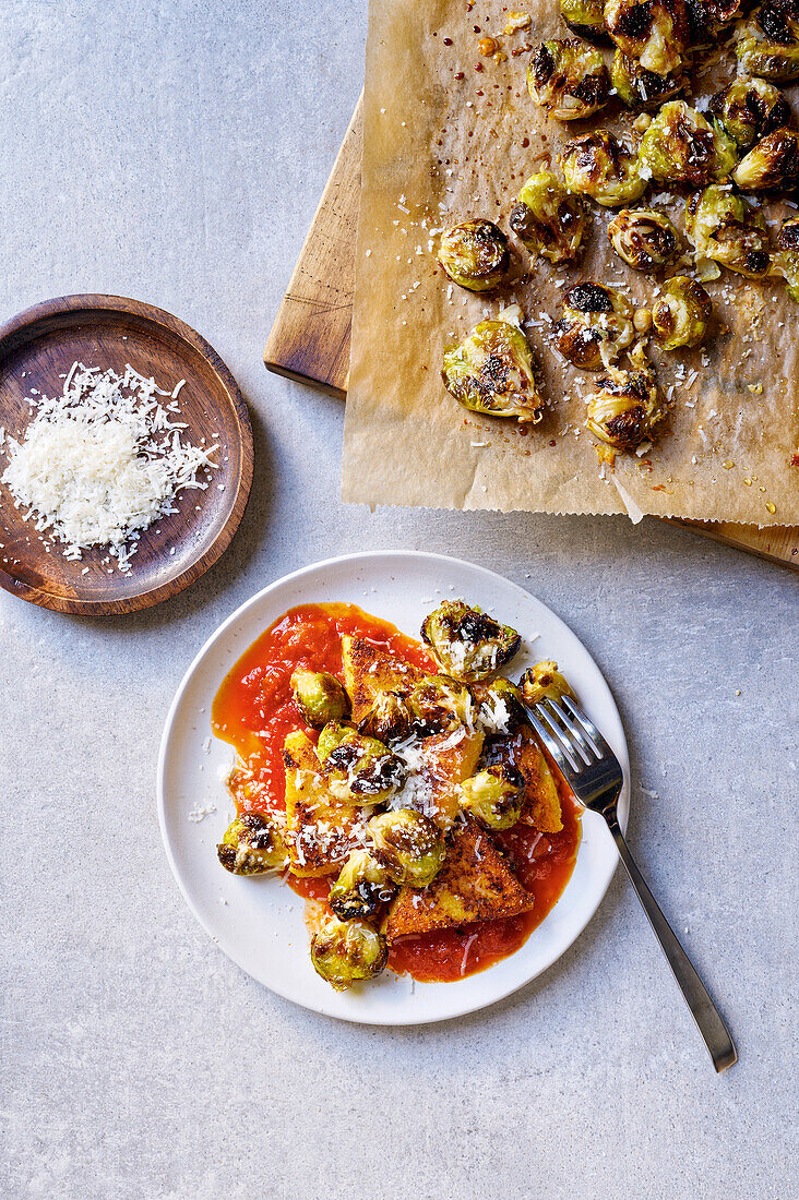 Polenta corners with tomato orange sauce and oven-roasted Brussels sprouts