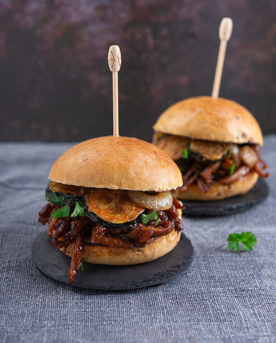 Vegan Pulled Mushroom Burgers with Fried Zucchini, Onions, and Barbecue Sauce