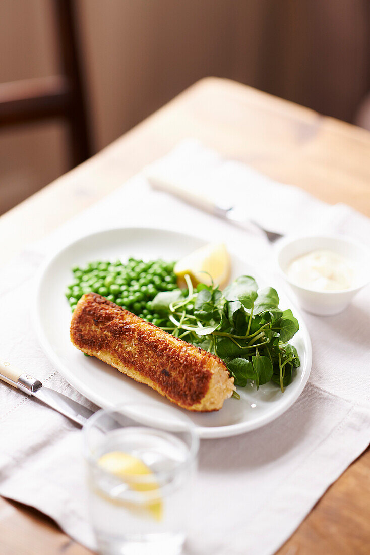 Fish cake fingers with peas and watercress