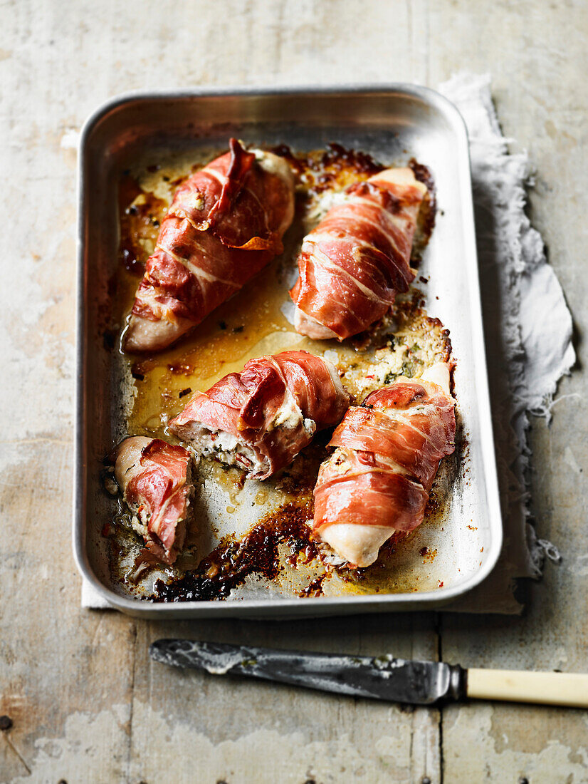 Chicken breast wrapped in prosciutto stuffed with goat cheese and tarragon