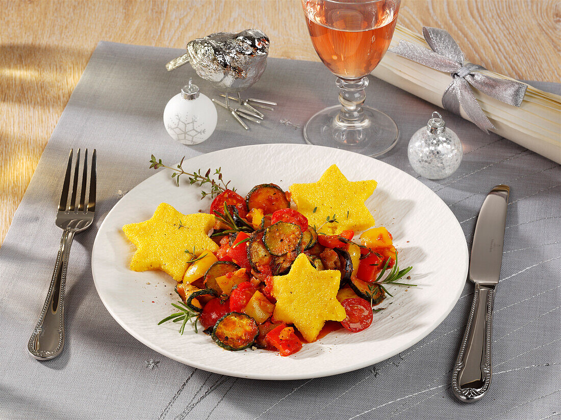 Colorful vegetable side dish with polenta stars for Christmas