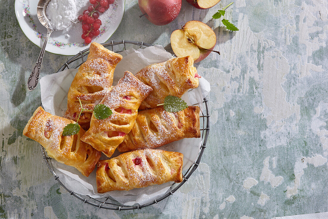 Apple pastries dusted with powdered sugar