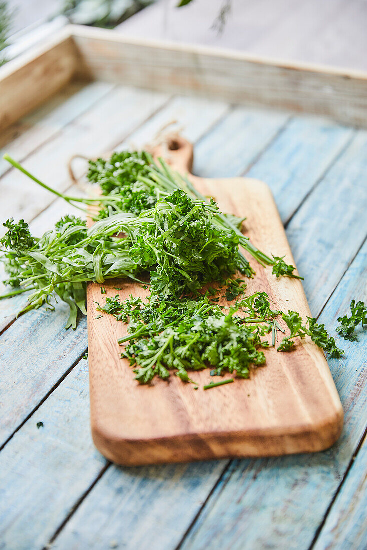 Fresh herbs on a wooden board
