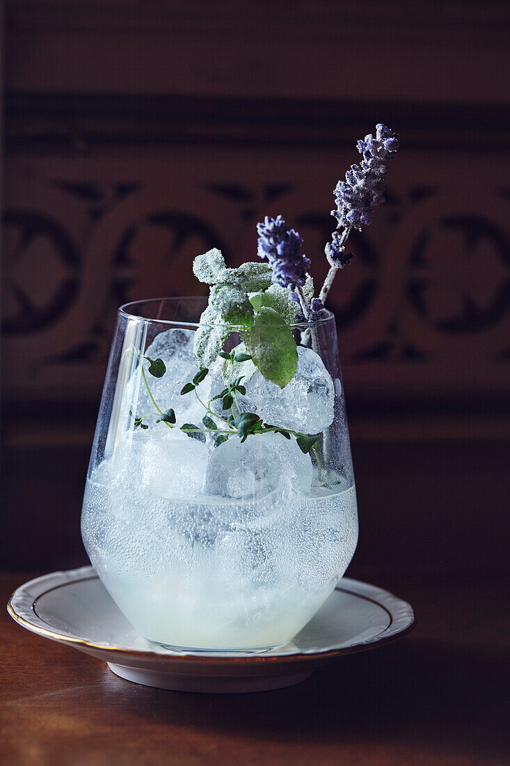 Cocktail with vodka, lemon, thyme and lavender