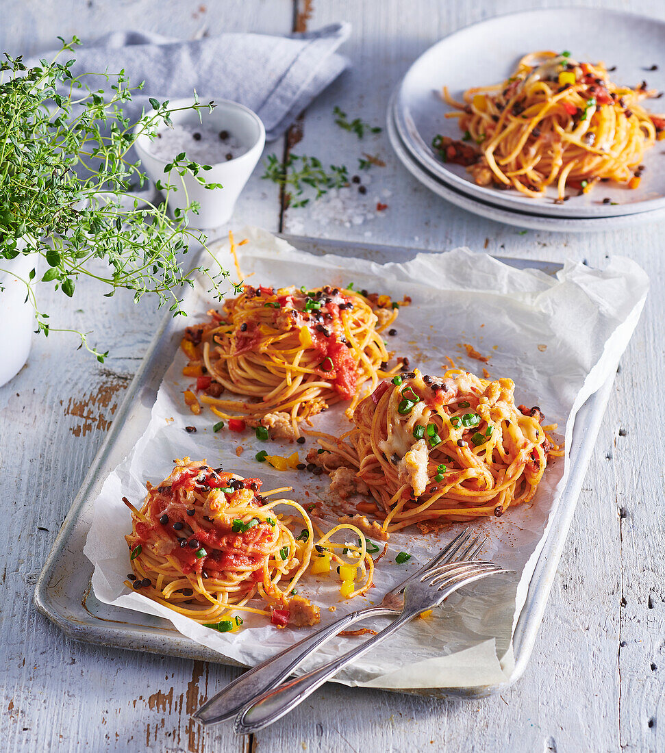 Spaghetti nests with chicken and cheese
