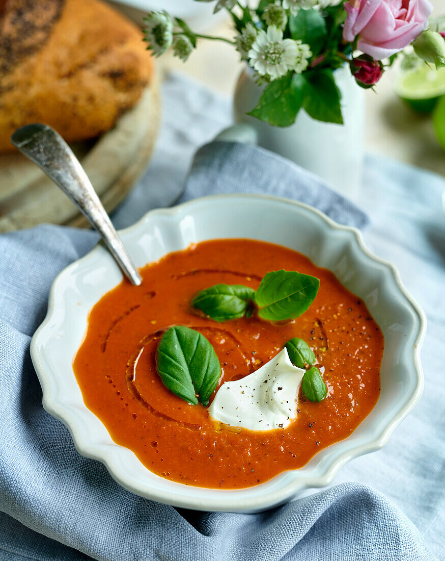 Roasted tomato soup with basil and creme fraiche